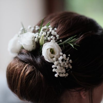 white flower hair accessories on the wedding day